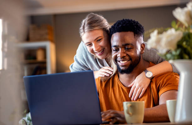 Happy couple reflecting on their successful wedding planning journey, symbolizing the achievement of their month-by-month wedding planning timeline.