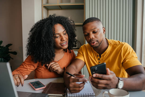 Couple reviewing final wedding details, making crucial checks during the last month of the wedding planning timeline.
